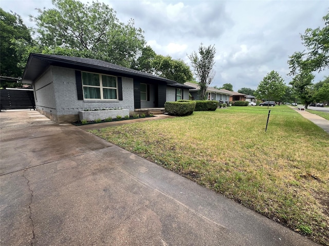 2721 San Marcus Ave, Dallas, TX 75228 - single story home featuring brick siding, a front lawn, and driveway