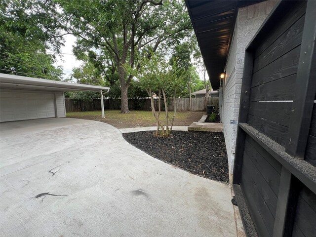 2721 San Marcus Ave, Dallas, TX 75228 - view of patio with a garage