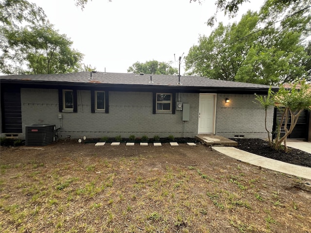 2721 San Marcus Ave, Dallas, TX 75228 - view of front of house with brick siding, crawl space, and central air condition unit