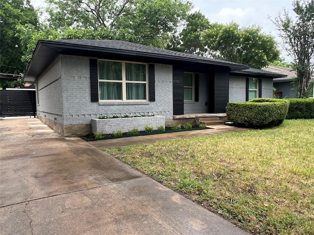 2721 San Marcus Ave, Dallas, TX 75228 - view of front of house featuring brick siding and a front yard