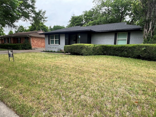 2721 San Marcus Ave, Dallas, TX 75228 - ranch-style home featuring brick siding and a front yard