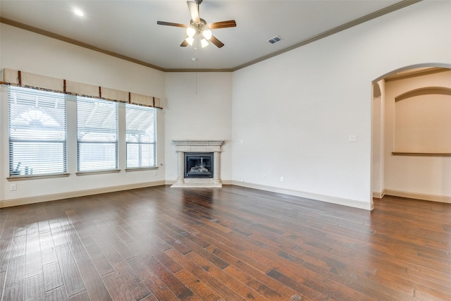 503 Olive Trl, Forney, TX 75126 - unfurnished living room with a ceiling fan, wood finished floors, baseboards, crown molding, and a premium fireplace