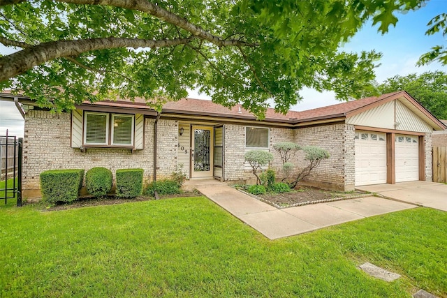 single story home with an attached garage, driveway, fence, and a front yard