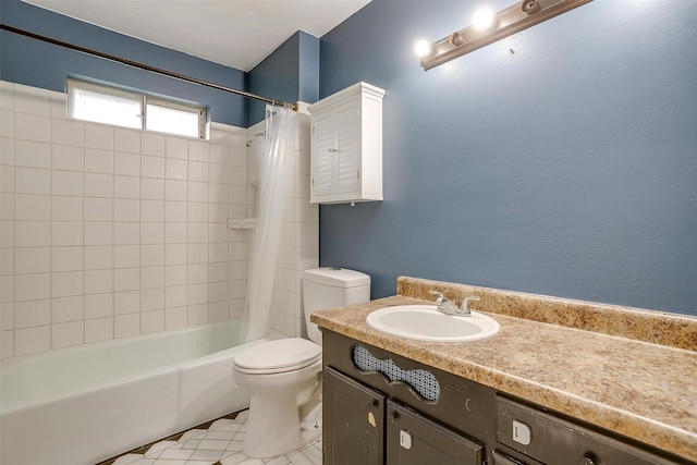 full bath with toilet, vanity, and shower / bath combo with shower curtain