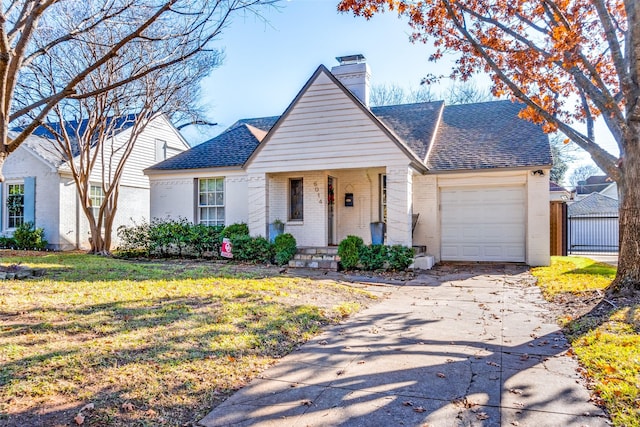 view of front of home with a chimney, brick siding, a garage, concrete driveway, and roof with shingles
