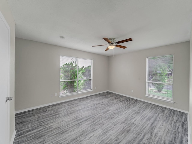 4250 Leland College Dr, Dallas, TX 75241 - unfurnished room with a ceiling fan, baseboards, and wood finished floors