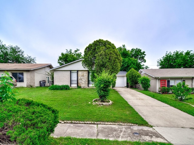 4250 Leland College Dr, Dallas, TX 75241 - single story home with concrete driveway, a garage, and a front lawn