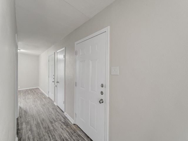4250 Leland College Dr, Dallas, TX 75241 - hall featuring baseboards and wood finished floors