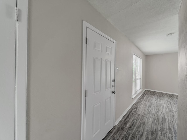 4250 Leland College Dr, Dallas, TX 75241 - entrance foyer featuring baseboards and dark wood-style flooring