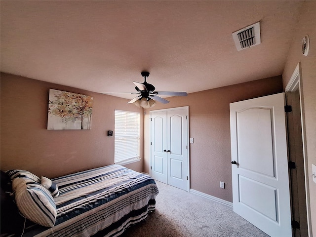 334 Miss Ellie Ln, Abilene, TX 79602 - bedroom with a closet, visible vents, carpet floors, a ceiling fan, and baseboards