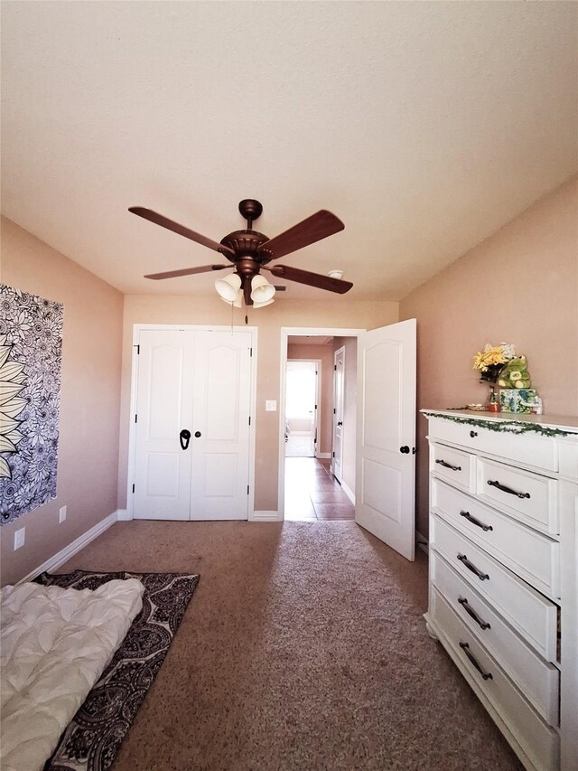 334 Miss Ellie Ln, Abilene, TX 79602 - bedroom with carpet flooring, baseboards, and ceiling fan