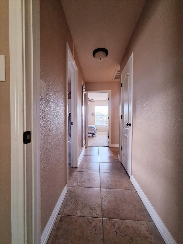 334 Miss Ellie Ln, Abilene, TX 79602 - corridor with baseboards and visible vents