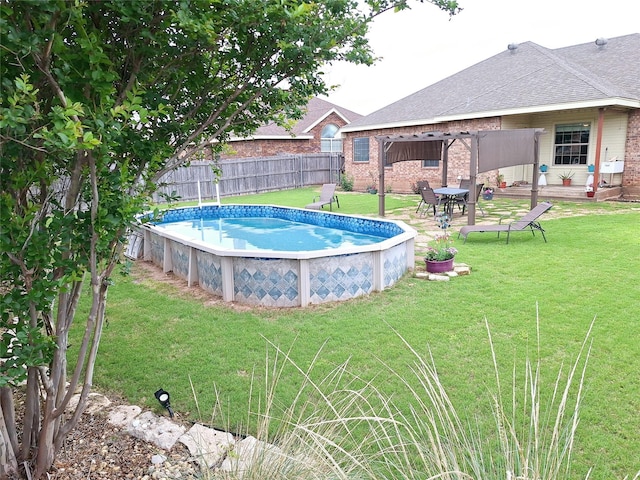 334 Miss Ellie Ln, Abilene, TX 79602 - view of swimming pool featuring a yard, a fenced in pool, and a fenced backyard