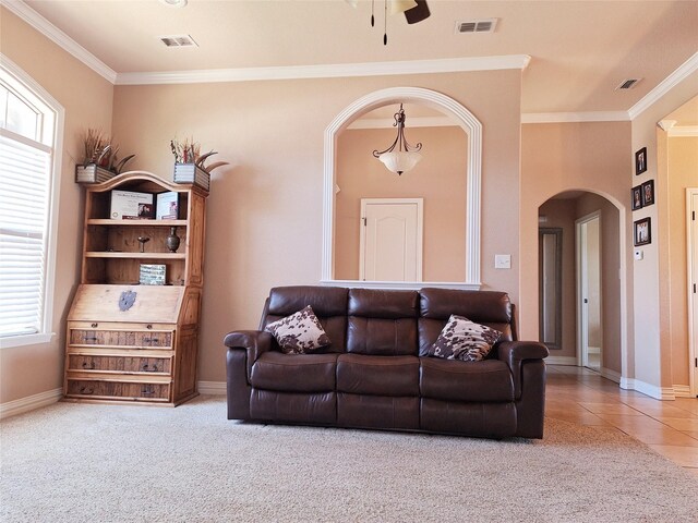 334 Miss Ellie Ln, Abilene, TX 79602 - carpeted living area with ceiling fan, ornamental molding, arched walkways, and a healthy amount of sunlight