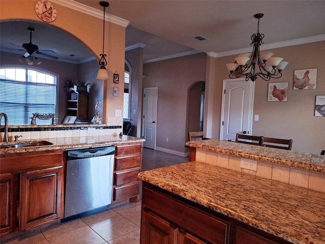 334 Miss Ellie Ln, Abilene, TX 79602 - kitchen with ornamental molding, dishwasher, arched walkways, and a sink