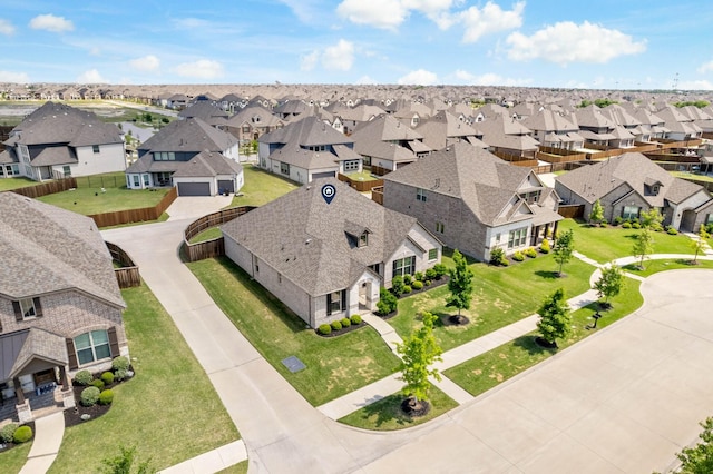 drone / aerial view with a residential view