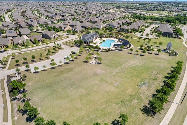 birds eye view of property with a residential view