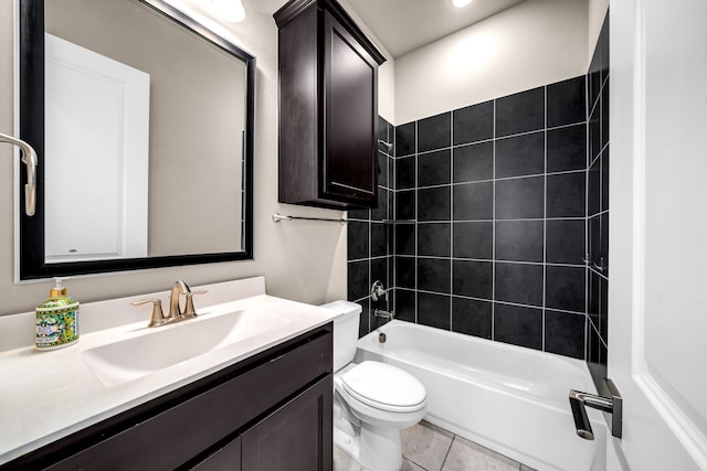 bathroom featuring toilet, vanity, shower / bathtub combination, and tile patterned flooring