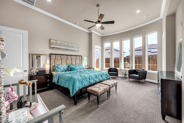 carpeted bedroom featuring ornamental molding, baseboards, ceiling fan, and recessed lighting