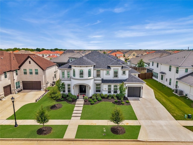 13393 Determine Dr, Frisco, TX 75035 - french country style house featuring driveway, a residential view, a shingled roof, and stucco siding