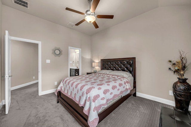 carpeted bedroom featuring vaulted ceiling, baseboards, and ceiling fan