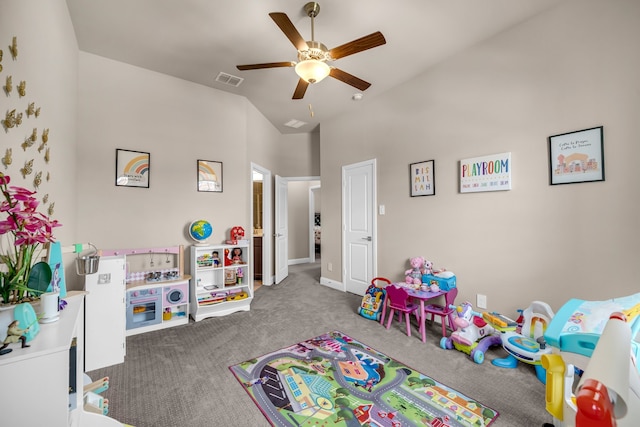 recreation room featuring carpet, ceiling fan, high vaulted ceiling, and baseboards
