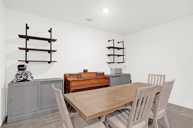 dining area featuring baseboards, recessed lighting, and visible vents