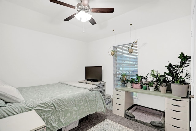 bedroom featuring ceiling fan and carpet floors