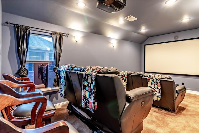 cinema featuring lofted ceiling, visible vents, recessed lighting, carpet flooring, and baseboards