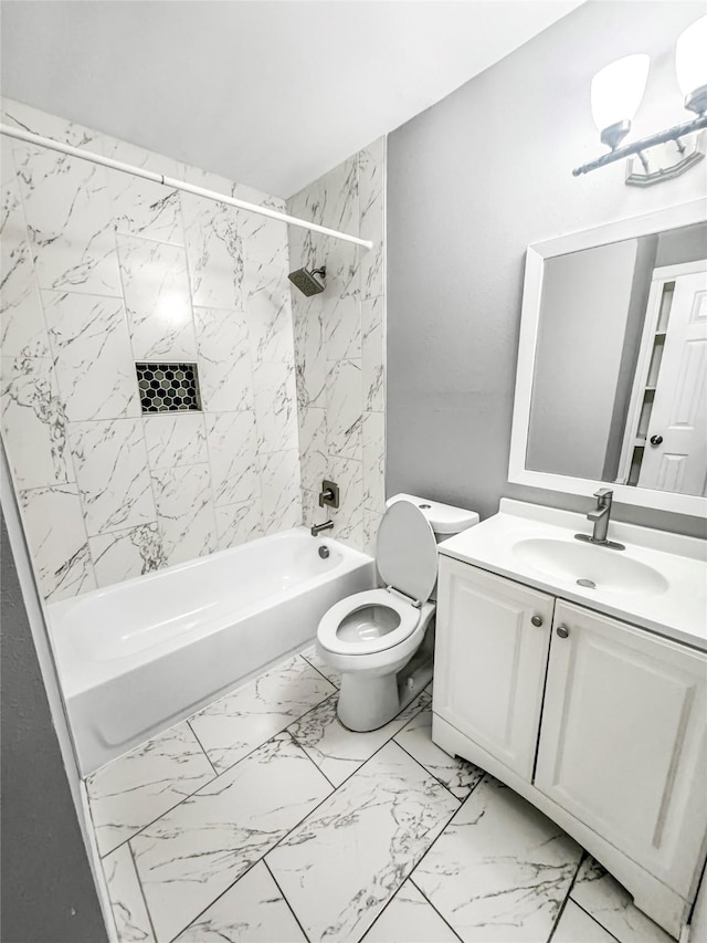 full bath with toilet, marble finish floor, vanity, and  shower combination