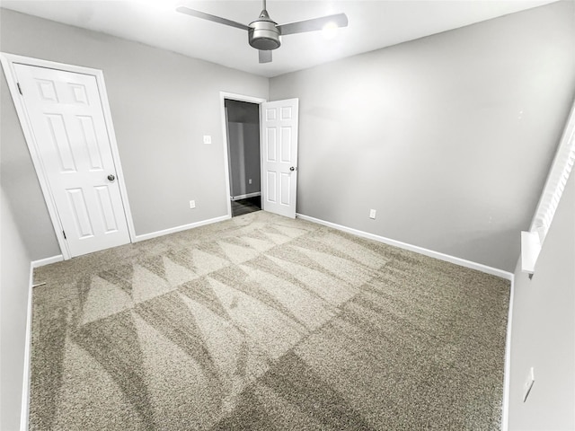unfurnished bedroom featuring baseboards, ceiling fan, and carpet floors