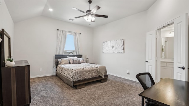 bedroom with vaulted ceiling, carpet, and baseboards