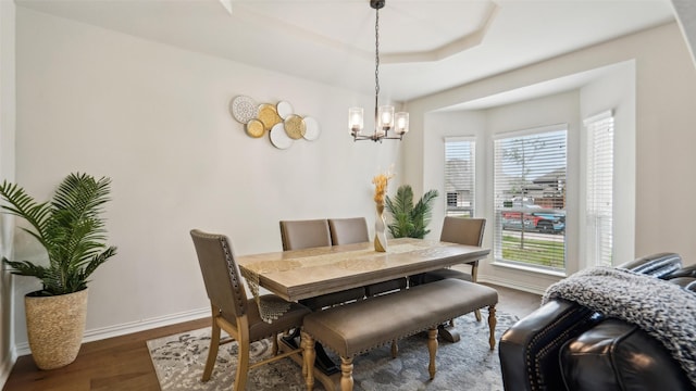 1106 Alaska Dr, Forney, TX 75126 - dining space featuring a chandelier, baseboards, and dark wood finished floors