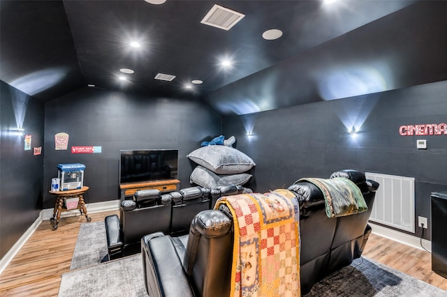 1932 Fm 36 S, Caddo Mills, TX 75135 - home theater room featuring vaulted ceiling, baseboards, visible vents, and wood finished floors