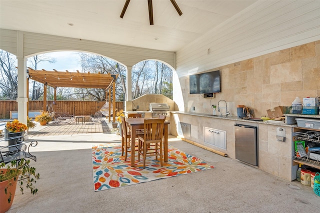 1932 Fm 36 S, Caddo Mills, TX 75135 - view of patio / terrace featuring a sink, a pergola, an outdoor kitchen, a fenced backyard, and grilling area