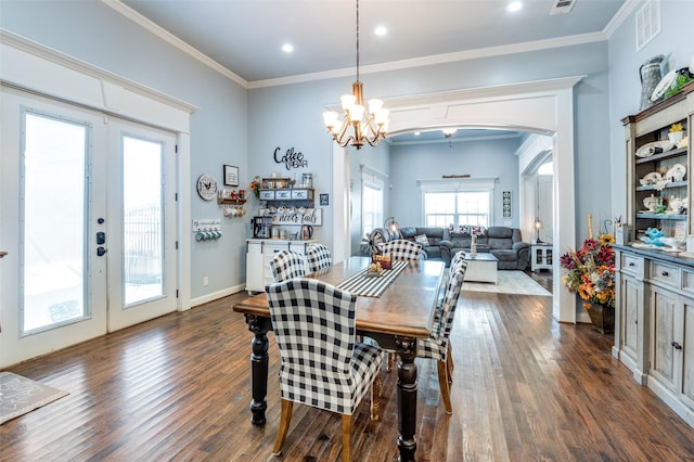 1932 Fm 36 S, Caddo Mills, TX 75135 - dining area with french doors, visible vents, dark wood finished floors, arched walkways, and a notable chandelier