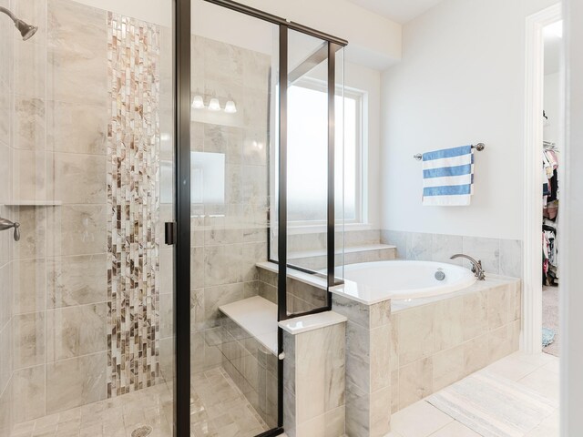 5932 Folsum Pl, Mckinney, TX 75070 - bathroom featuring a bath, a stall shower, and tile patterned floors