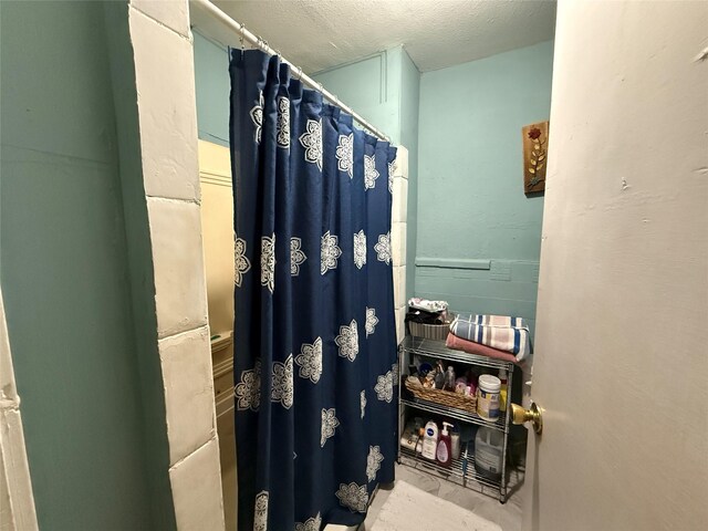 full bath with a shower with shower curtain