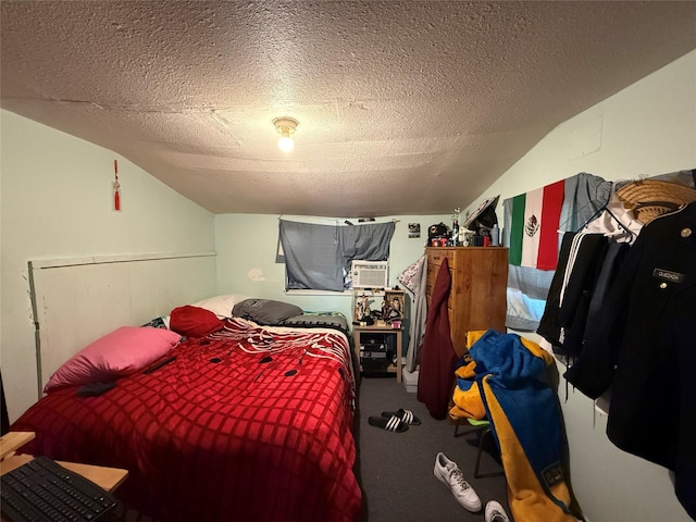 bedroom featuring carpet, a textured ceiling, and lofted ceiling