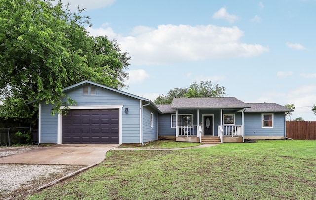 1015 Van Winkle St, Weatherford, TX 76086 - single story home with a porch, concrete driveway, and an attached garage