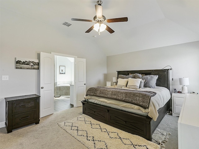 1455 Radecke Rd, Krum, TX 76249 - bedroom with lofted ceiling, carpet floors, ensuite bath, and ceiling fan