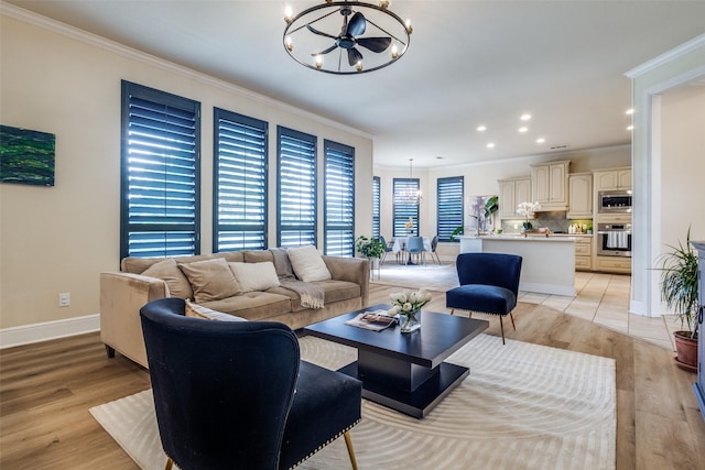 1305 Burgundy Ct, Southlake, TX 76092 - living area featuring a chandelier, ornamental molding, light wood-style flooring, baseboards, and recessed lighting