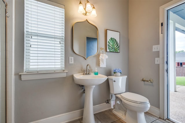 1305 Burgundy Ct, Southlake, TX 76092 - full bath featuring baseboards, toilet, and tile patterned floors
