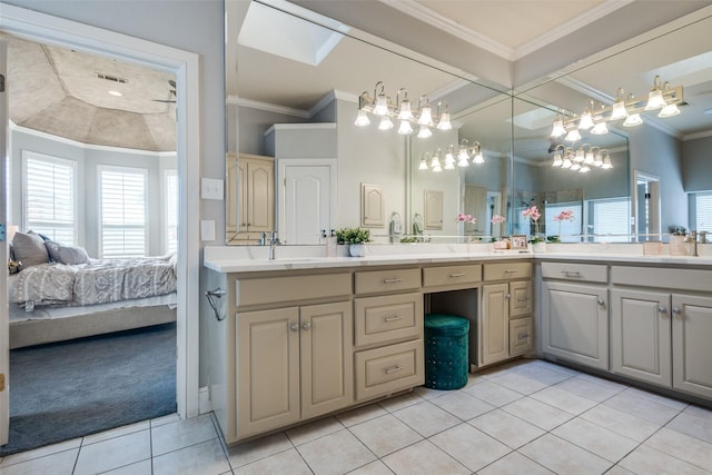 1305 Burgundy Ct, Southlake, TX 76092 - bathroom with tile patterned flooring, crown molding, connected bathroom, double vanity, and a chandelier