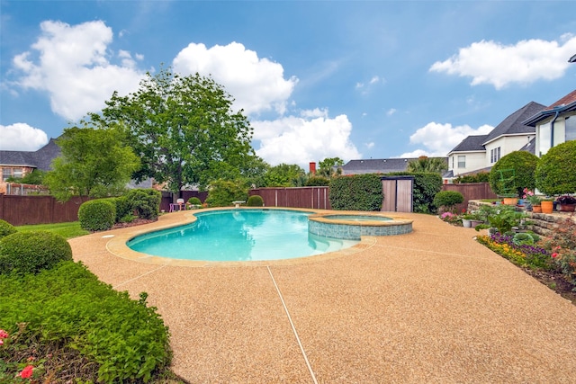 1305 Burgundy Ct, Southlake, TX 76092 - view of swimming pool featuring fence, a pool with connected hot tub, and a patio area