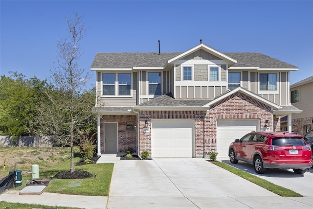view of front of property featuring an attached garage, concrete driveway, a shingled roof, and board and batten siding