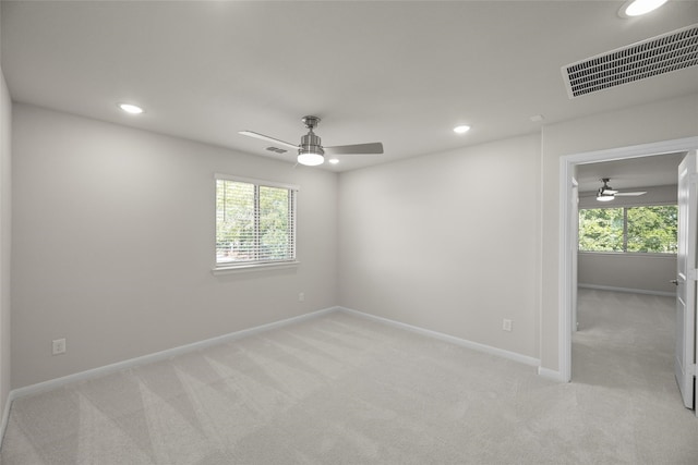 216 Griffith, Princeton, TX 75407 - spare room featuring a ceiling fan, light colored carpet, healthy amount of natural light, and recessed lighting