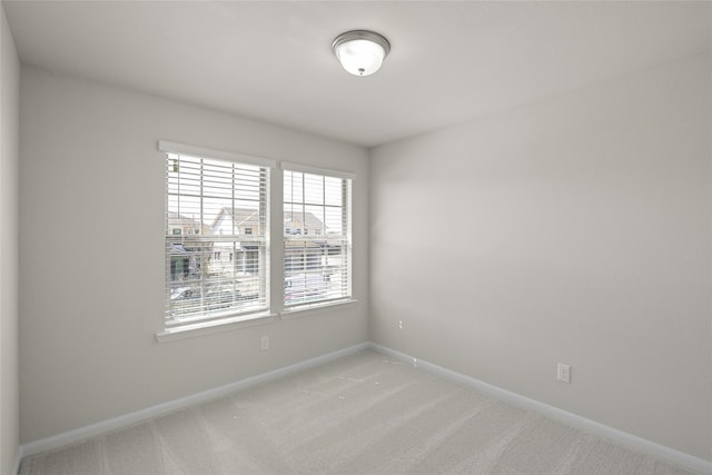 216 Griffith, Princeton, TX 75407 - spare room featuring light carpet and baseboards