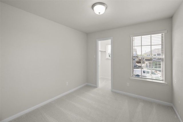 216 Griffith, Princeton, TX 75407 - spare room featuring baseboards and light colored carpet