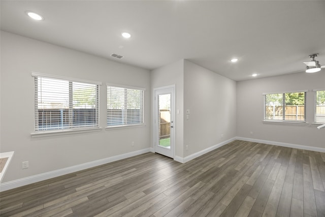 216 Griffith, Princeton, TX 75407 - unfurnished room with wood finished floors, baseboards, and recessed lighting